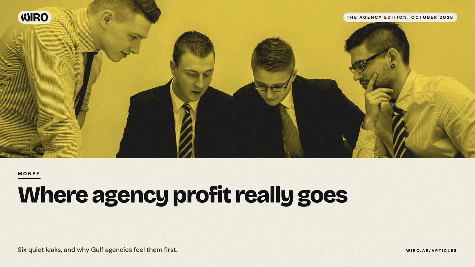 A cover with a yellow-toned photo of four colleagues reading papers at a table, above the headline about agency profit