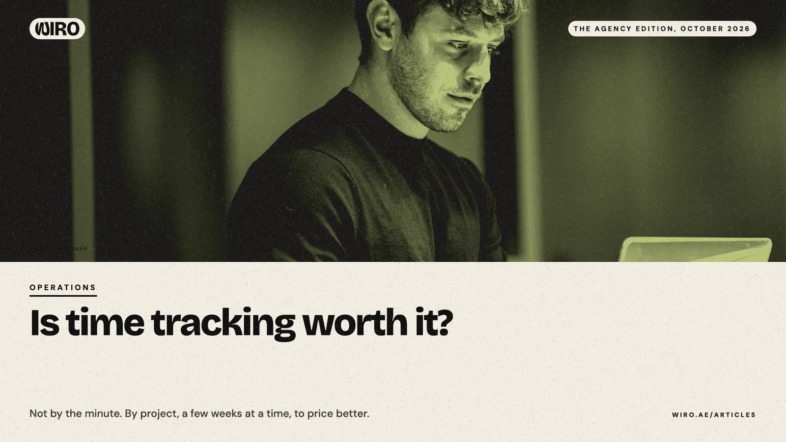 A cover with a green-toned photo of a man working late at a laptop, above the headline about time tracking