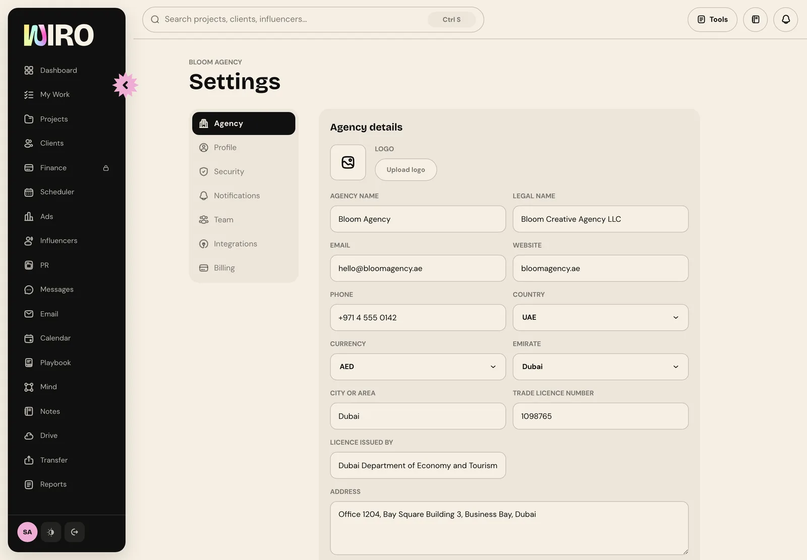 Wiro's Settings on the Agency tab with logo, agency name, legal name, email, website, phone, country, currency, emirate, city, trade licence number and licence issuer